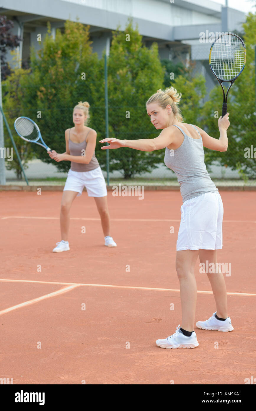 close up two attractive female tennis players have a fun Stock Photo Alamy