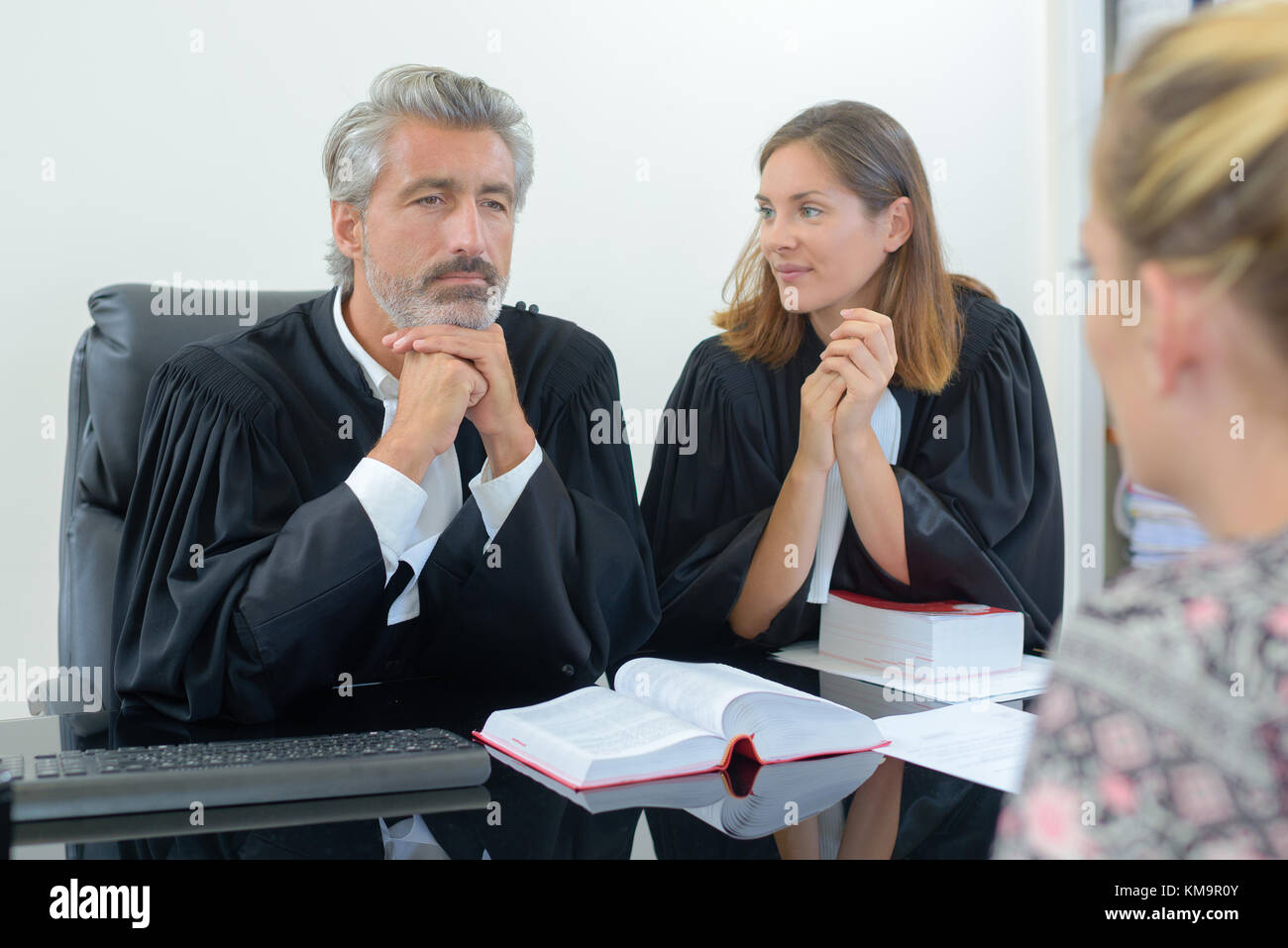 team of lawyers consulting client in office Stock Photo Alamy