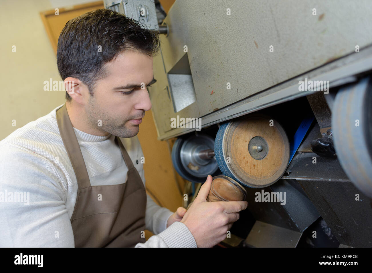 shoemaker repairs a shoe Stock Photo Alamy