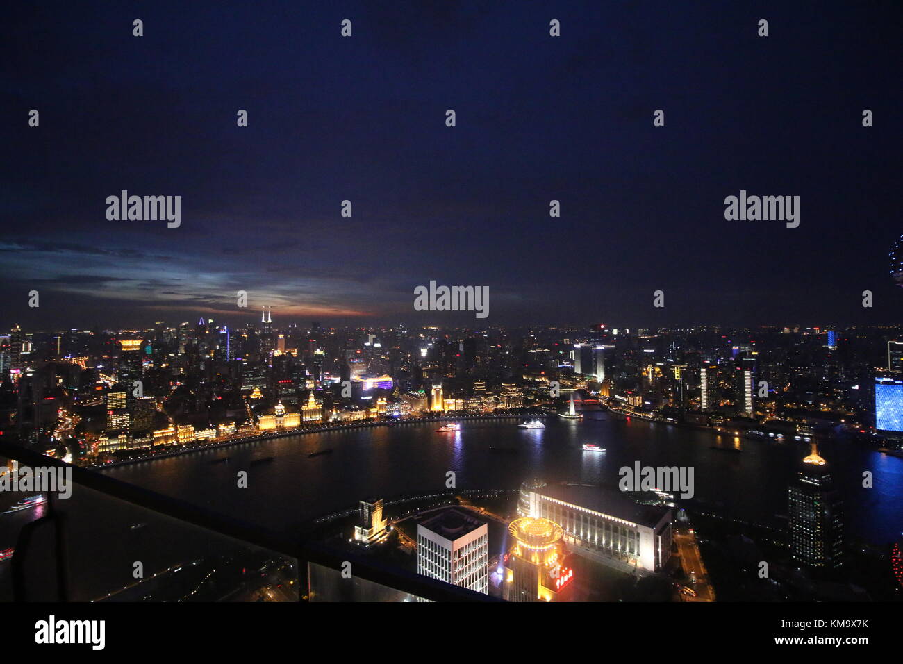 Shanghai is the biggest city from China, in this picture i captured the Bund, Huangpu River, Oriental Pearl Tower and the beautiful city lights Stock Photo