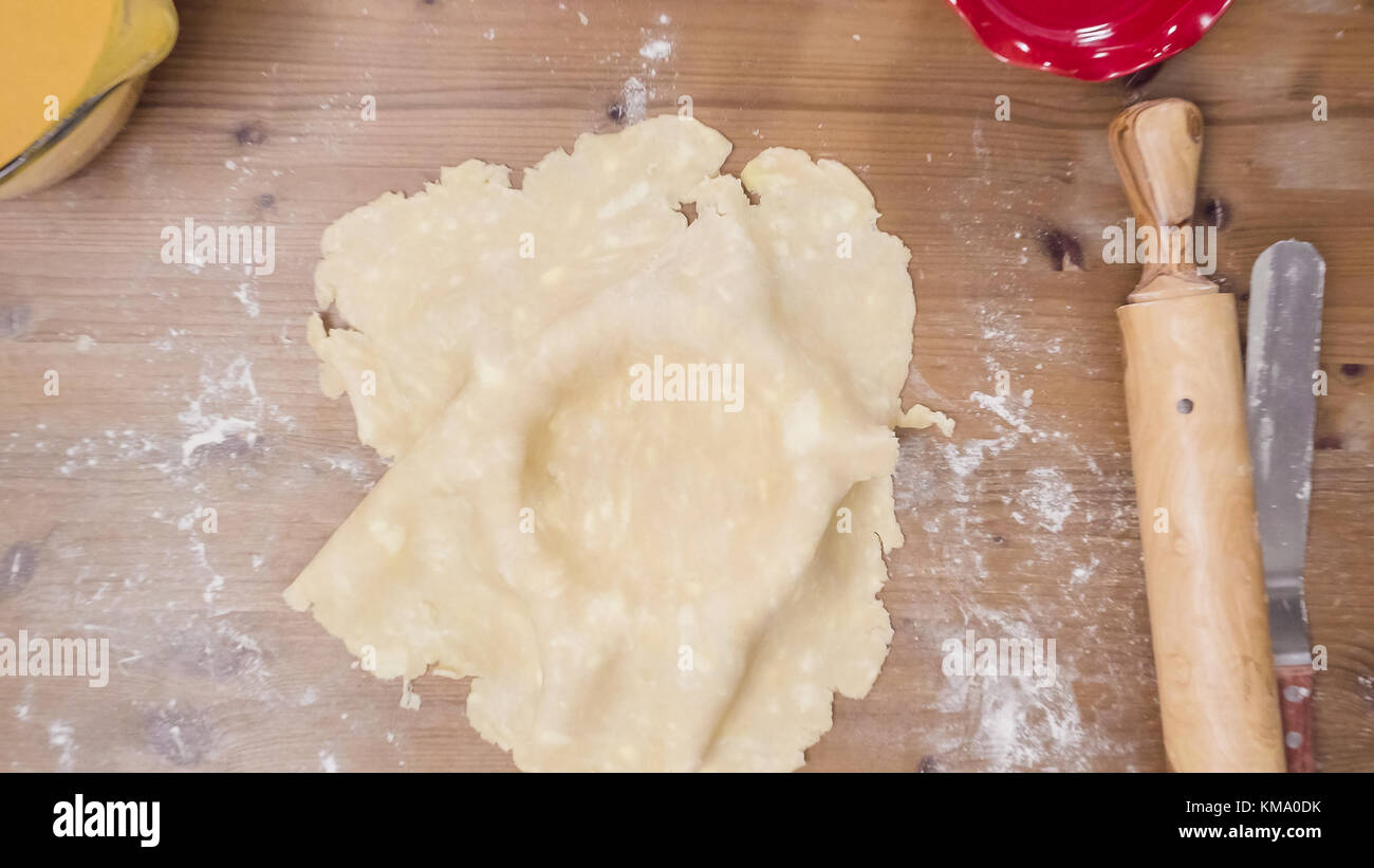 step-by-step-making-pie-crust-from-scratch-to-bake-pumpkin-pie-stock