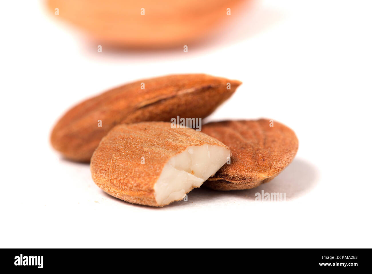 Sweet almond drupes isolated on a white background Stock Photo Alamy