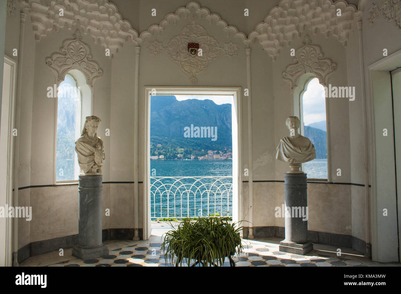 View on coast line of Lake Como, Italy, Lombardy region. Italian landscape view from Moorish Pavilion in Villa Melzi Garden famous landmark of Bellagi Stock Photo