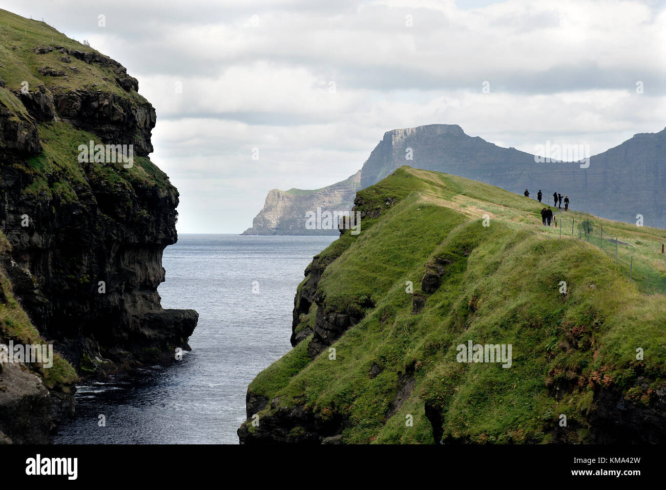 Gjogv, Faroe Islands - September 2, 2017: People enjoying the beautiful