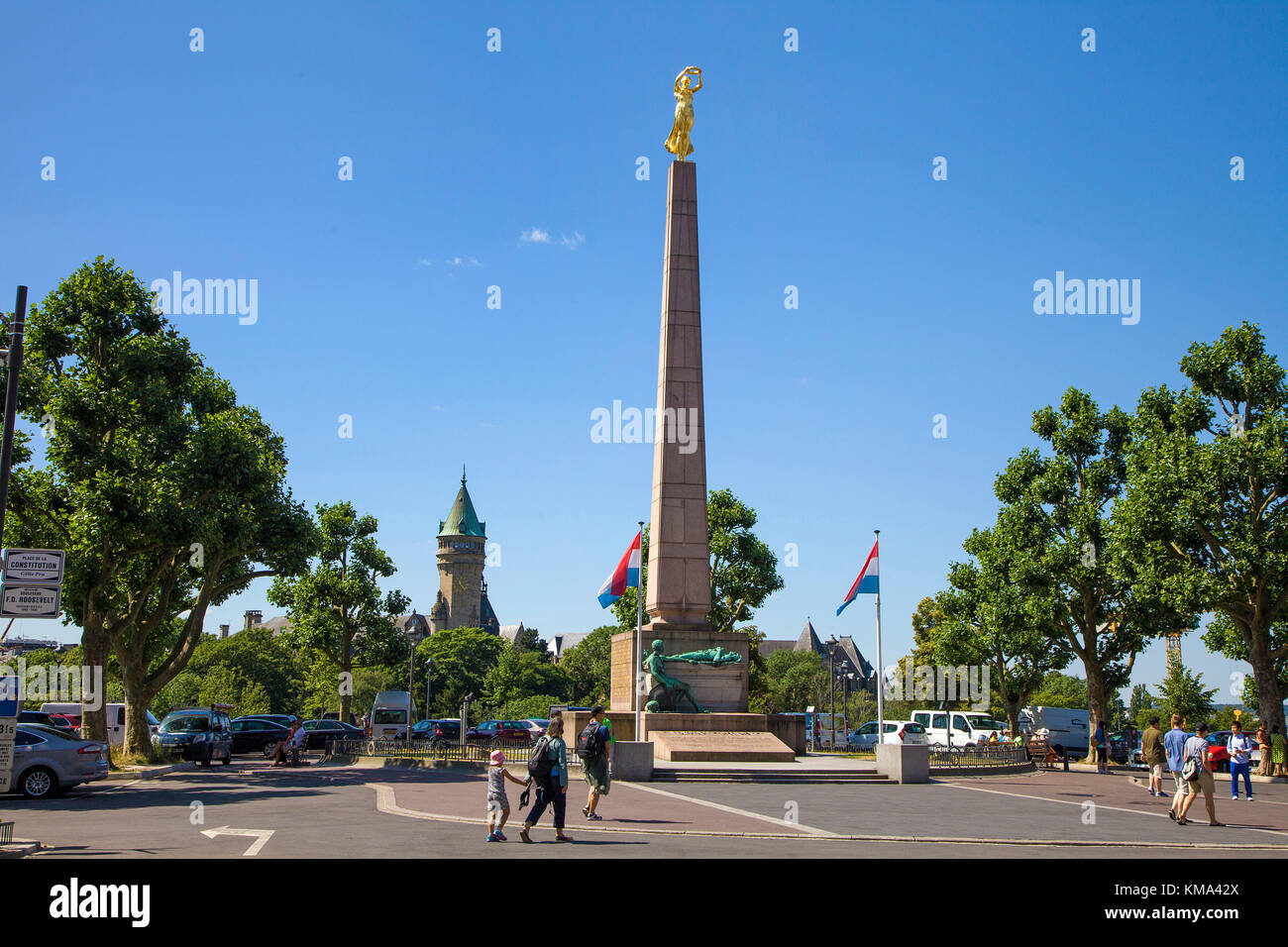 Stone obelisk with golden woman, Gelle Fra, memorial at Place de la Constitution, Luxembourg-city, Luxembourg, Europe Stock Photo