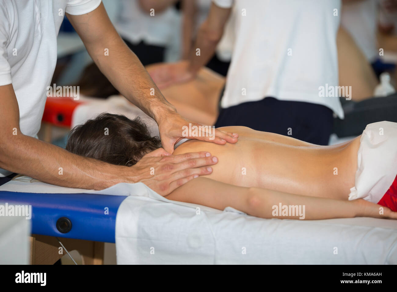 athlete-s-back-massage-after-fitness-activity-wellness-and-sport-stock