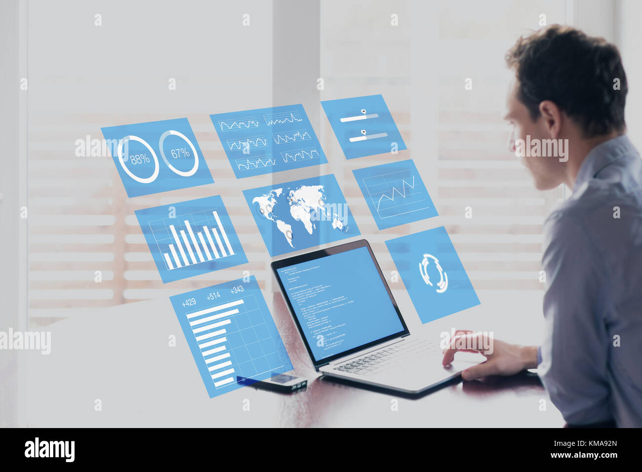 Businessman working with holographic augmented reality (AR) screen technology to analyze business analytics key performance indicator and charts on fi Stock Photo