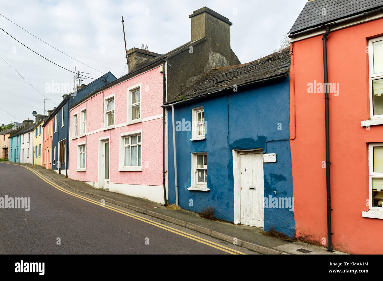 Row of coloured houses in Schull, West Cork, Ireland with copy space. Stock Photo