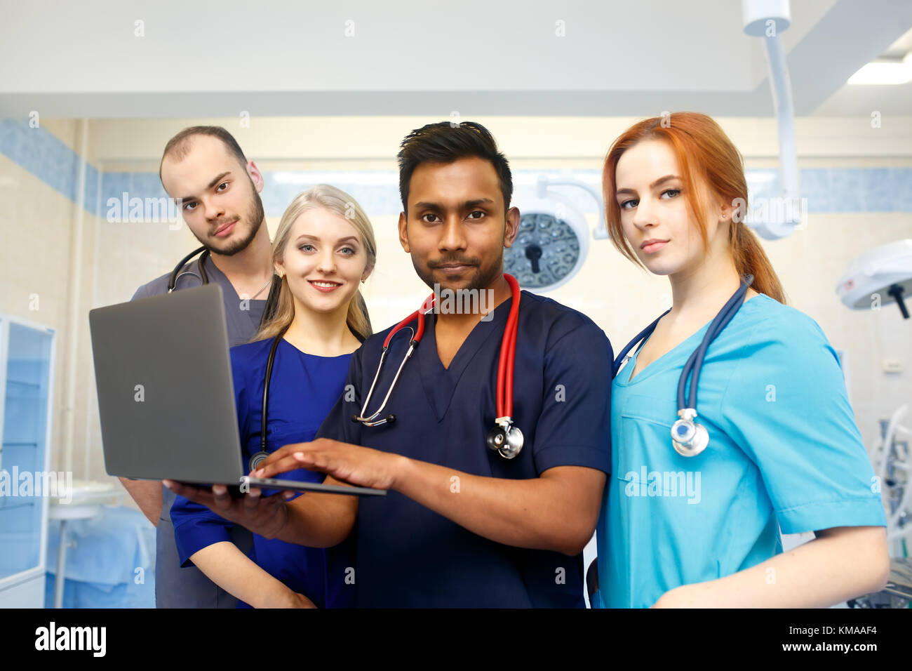 Medical team in coat hi-res stock photography and images - Alamy