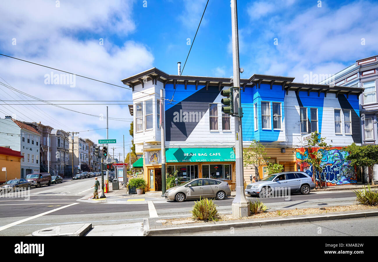 San Francisco, USA - August 24, 2015: Colorful houses typical for San francisco by Divisadero Street. Stock Photo