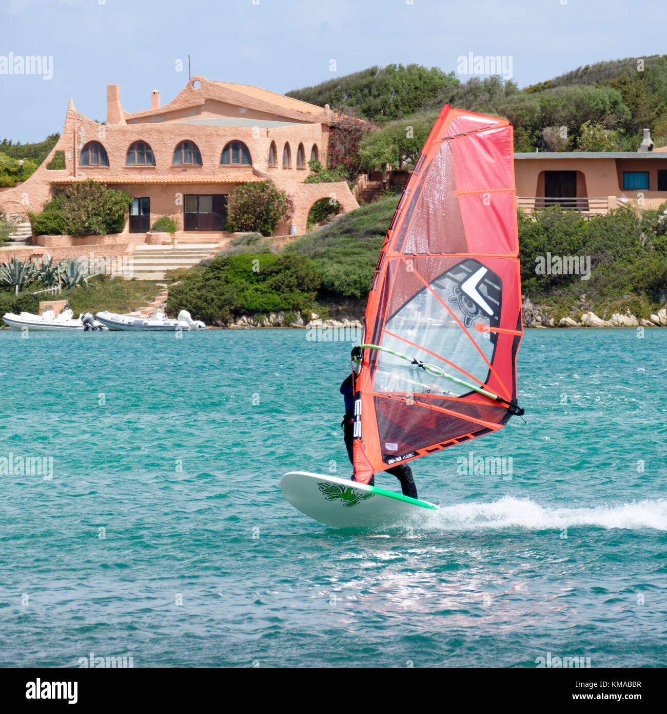PORTO POLLO, SARDINIA/ITALY - MAY 21 : Windsurfing at Porto Pollo in Sardinia on May 21, 2015. Unidentified man Stock Photo