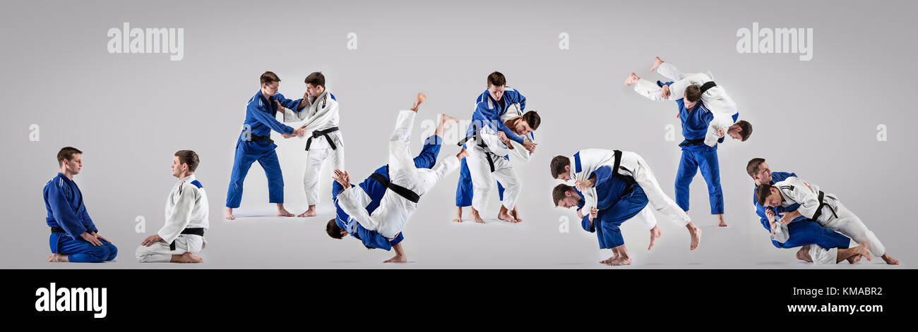 The two judokas fighters fighting men Stock Photo