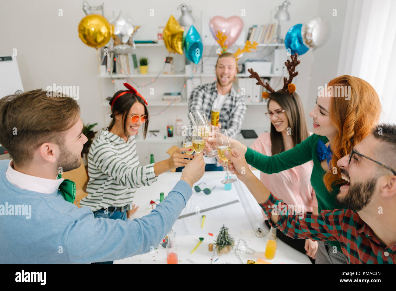 Employees toasting at office party Stock Photo