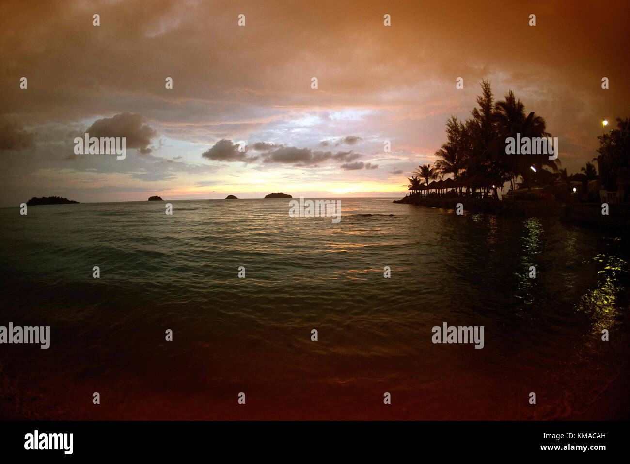 Silhouette sunset of tropical beach on background Thailand Stock Photo ...