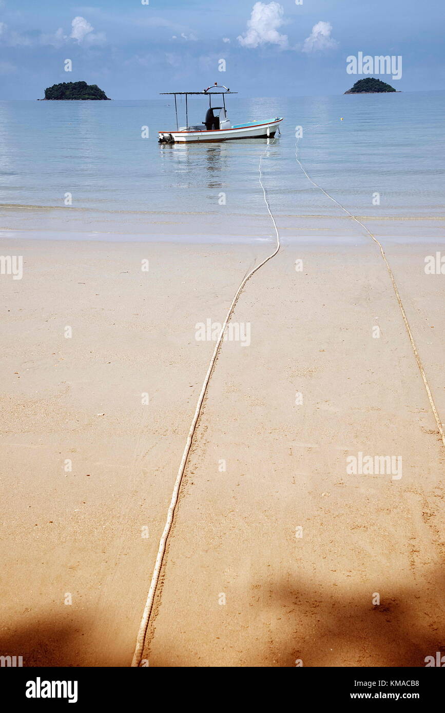 Tourist boat at the beach in Thailand. Stock Photo