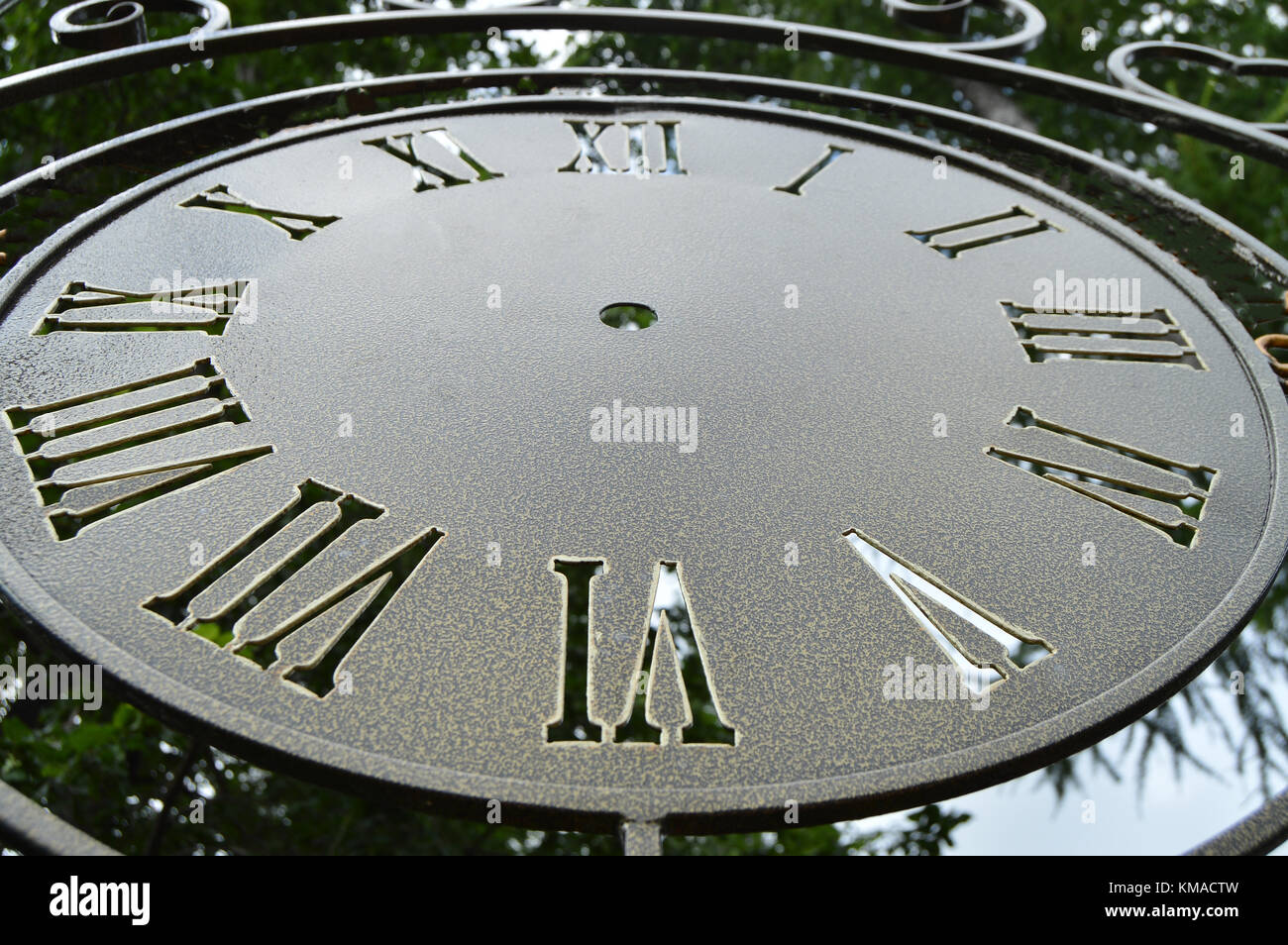 Dial vintage wall clocks, closeup dial with Roman numerals Stock Photo Alamy