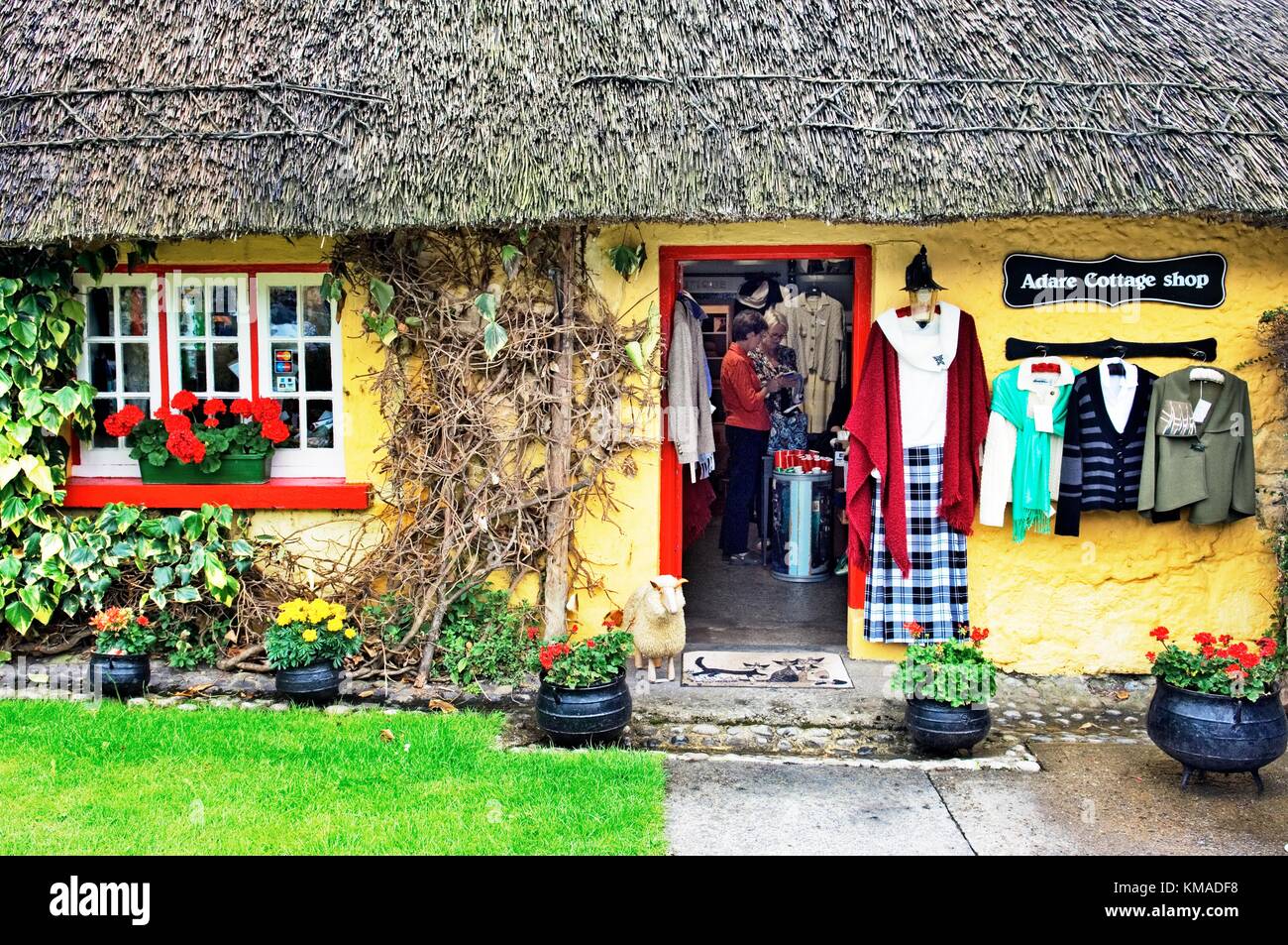 Thatched cottage shop in the picturesque village of Adare, County Limerick, Ireland. Stock Photo