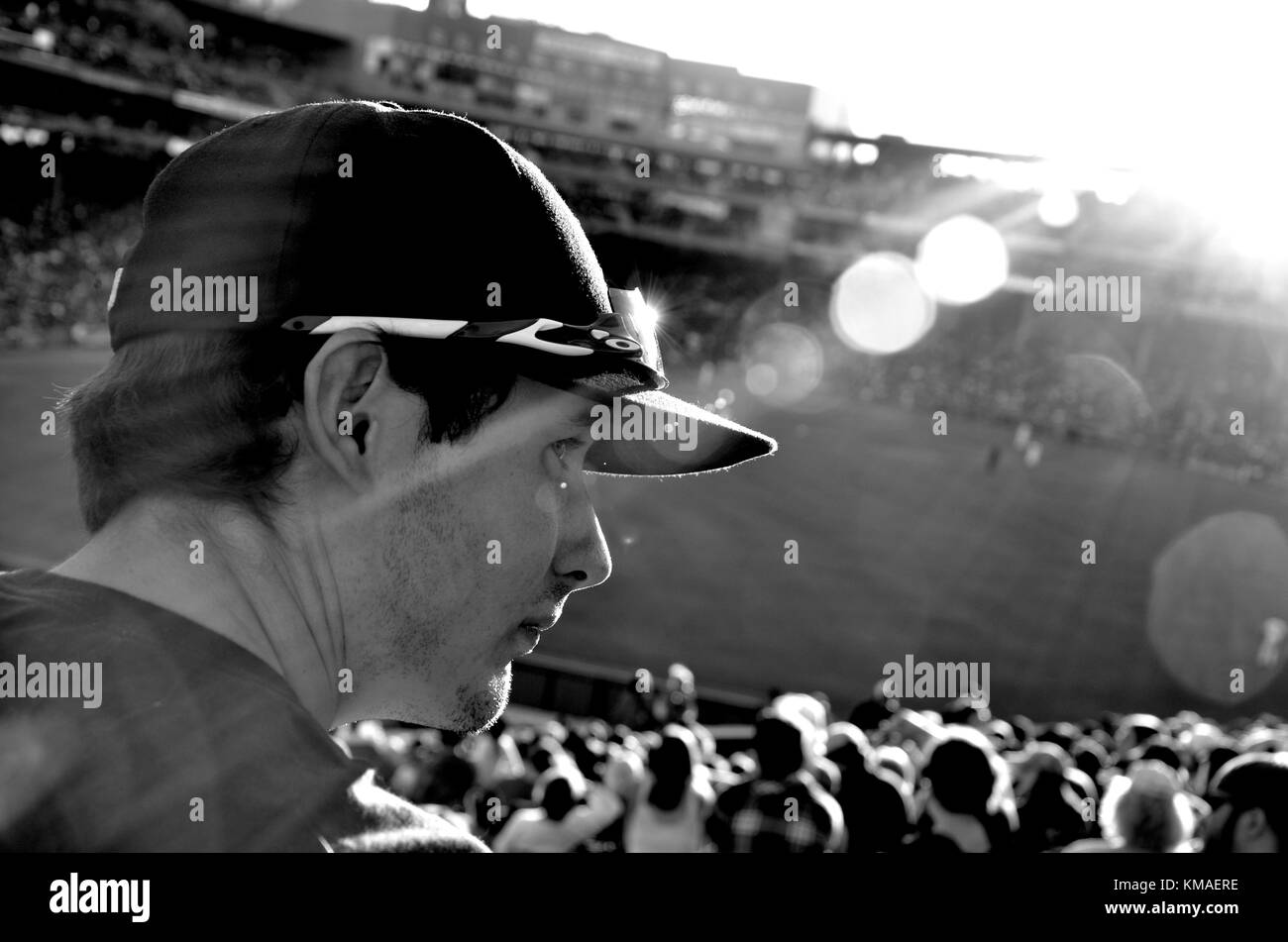 Fan in baseball cap at Fenway Park, home of the Boston Red Sox, Yawkey Way, Boston, Mass. Stock Photo