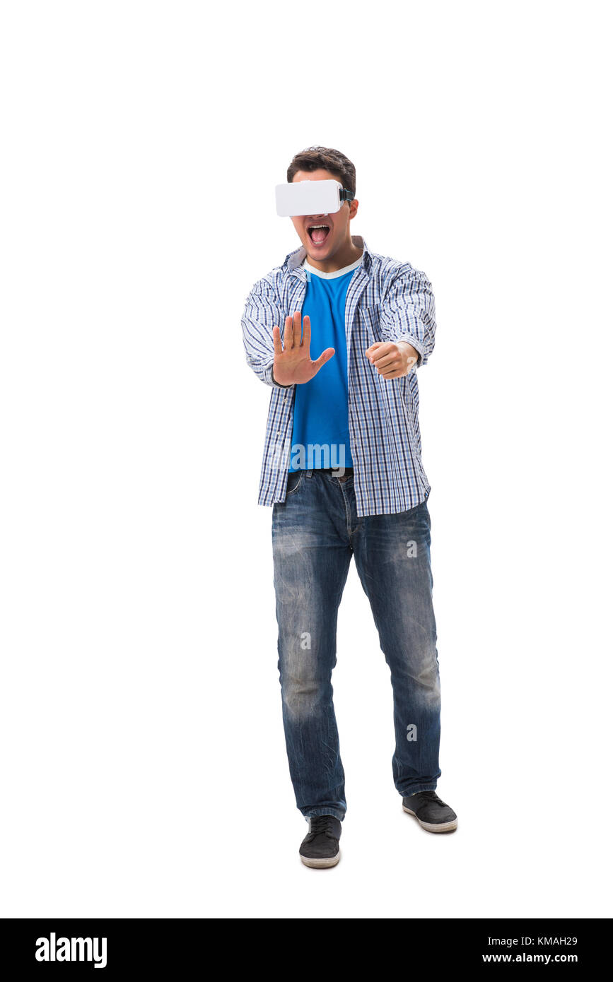 Young man wearing virtual reality VR glasses Stock Photo - Alamy
