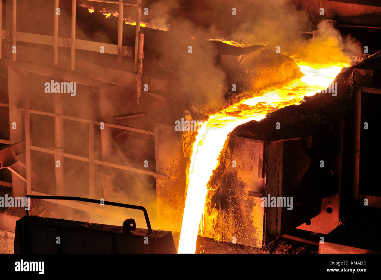 Liquid metal from blast furnace in steel plant Stock Photo