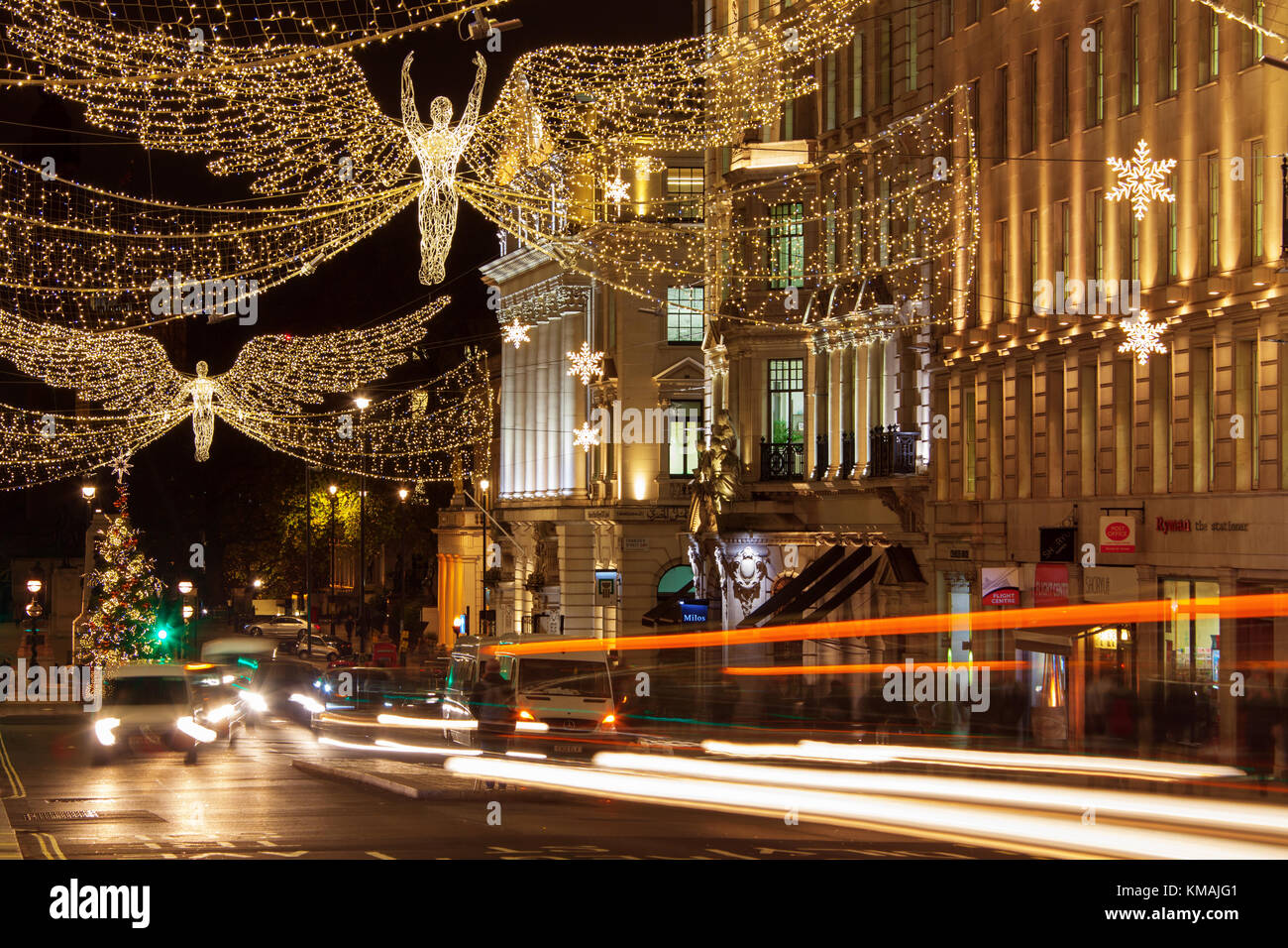 LONDON, UK - DECEMBER 4th, 2017: Christmas lights on Regents Street St James. Beautiful Christmas decorations attract  shoppers and tourists during th Stock Photo