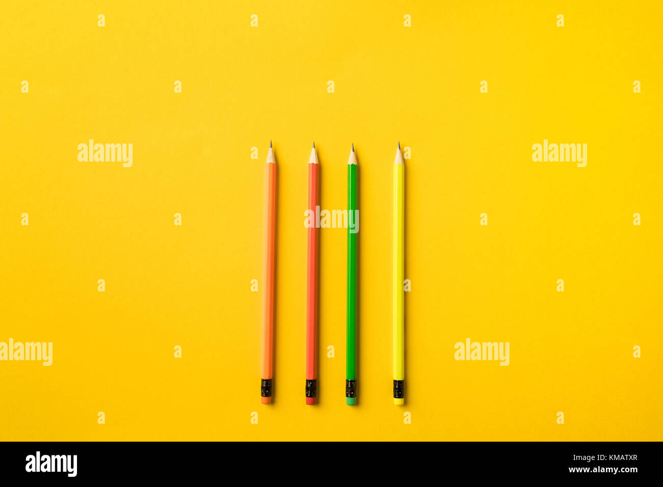 Four colored pencils with erasers Stock Photo Alamy