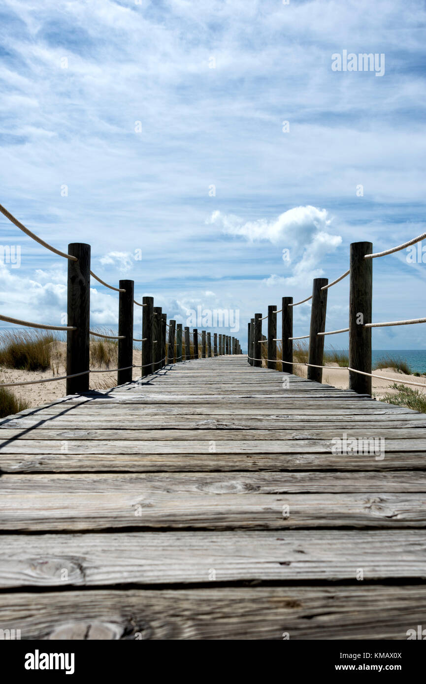 wooden boardwalk on Praia de Cabanas, Portugal Stock Photo