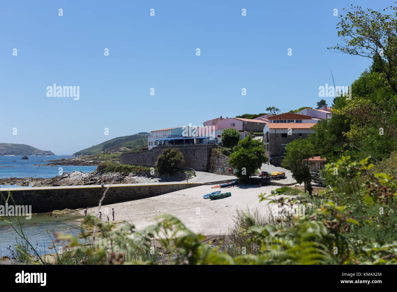 View of Dornas beach and harbour in Ons Island, Atlantic islands National Park, Pontevedra, Galicia, Spain Stock Photo