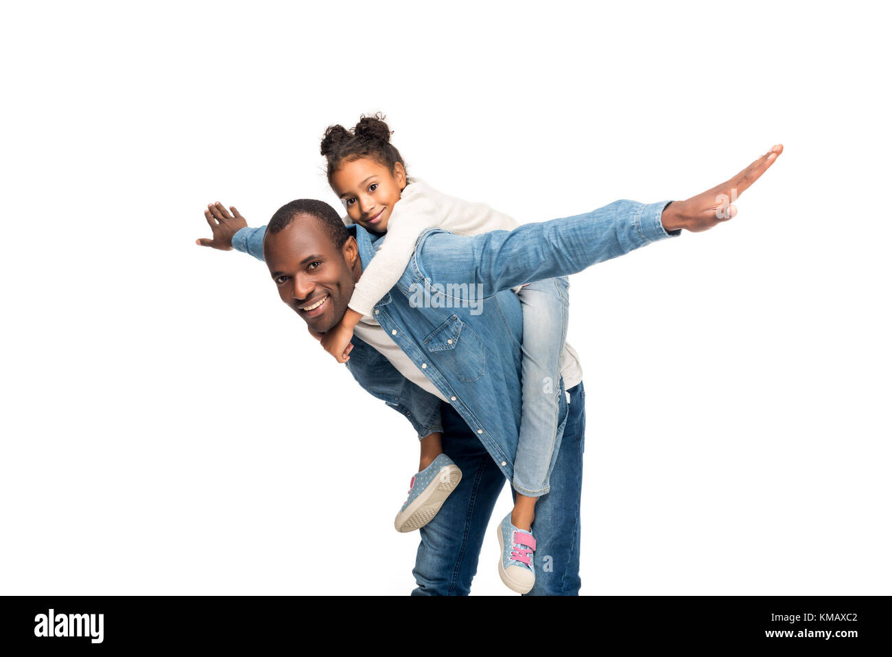 father piggybacking daughter Stock Photo