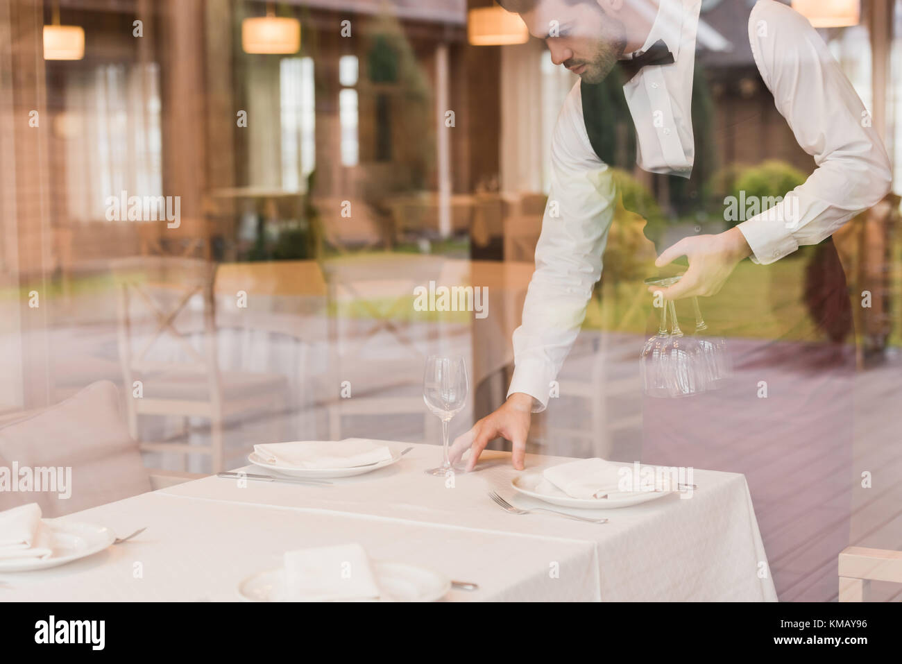 waiter serving table Stock Photo Alamy