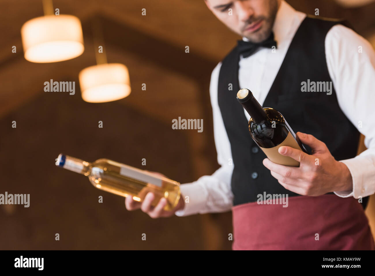 waiter choosing wine Stock Photo Alamy
