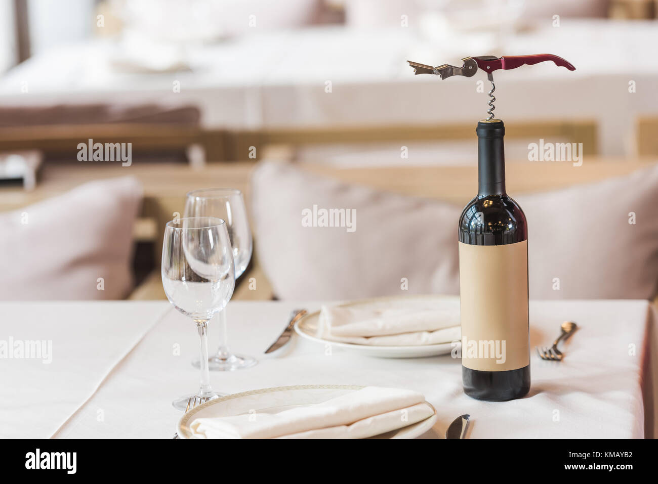 Bottle with corkscrew Stock Photo Alamy