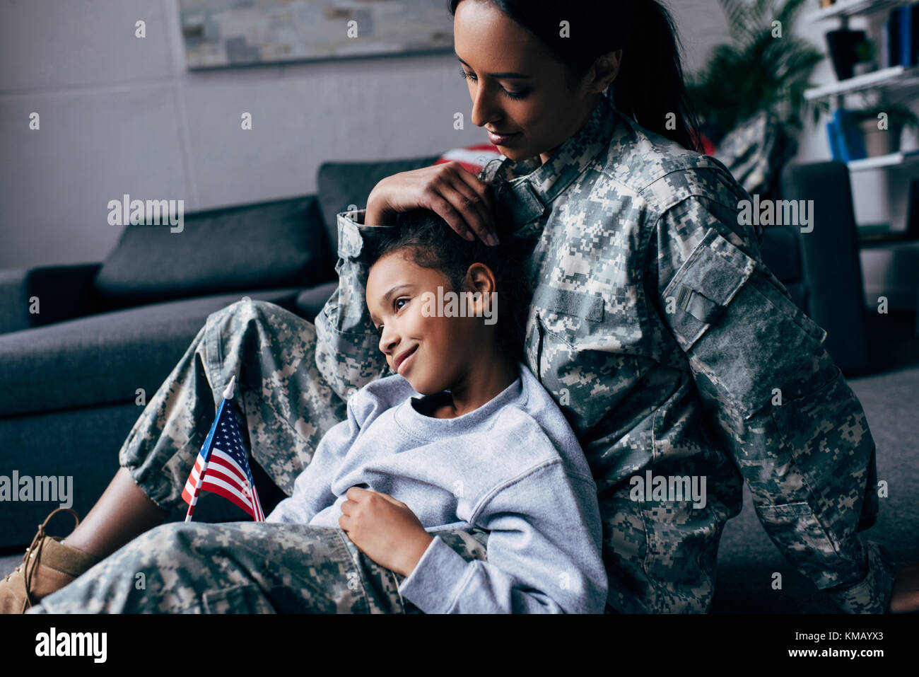 daughter and female soldier Stock Photo Alamy