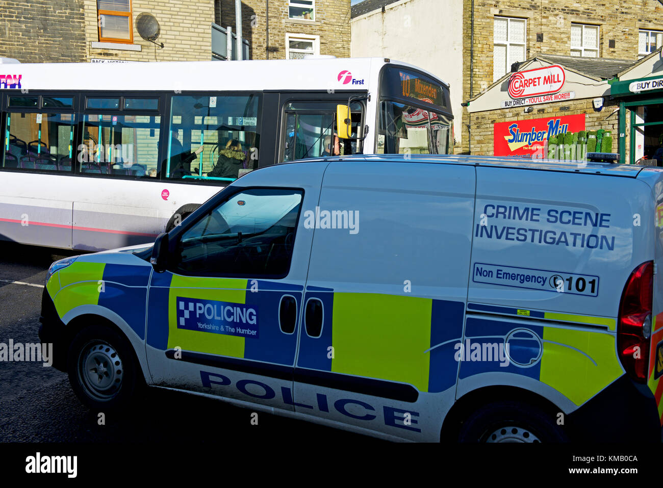 Crime Scene Investigation police van, and bus, England UK Stock Photo