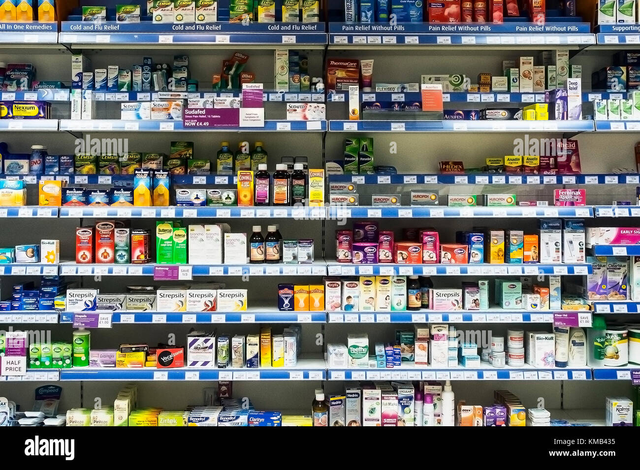 Shelves of medication on sale in a pharmacy. Stock Photo