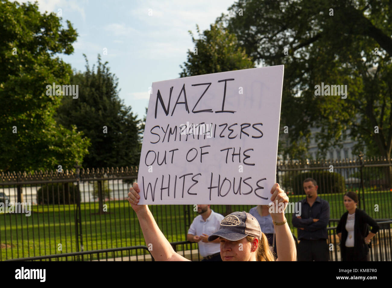 Protesters outside the White House is the official residence and workplace of the President of the United States, Washington DC. Stock Photo