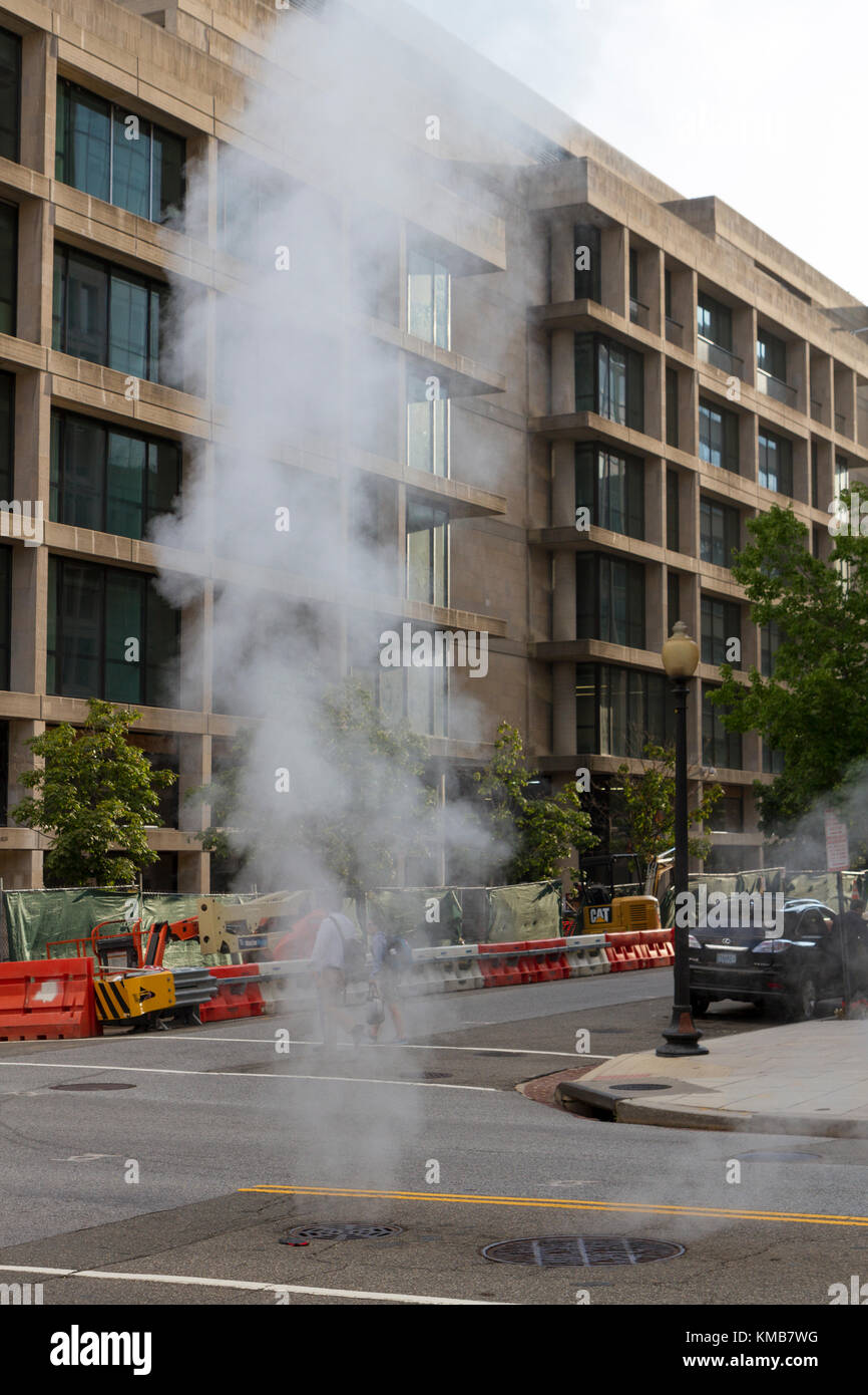 Steam rising from a road vent in Washington DC, United States Stock ...