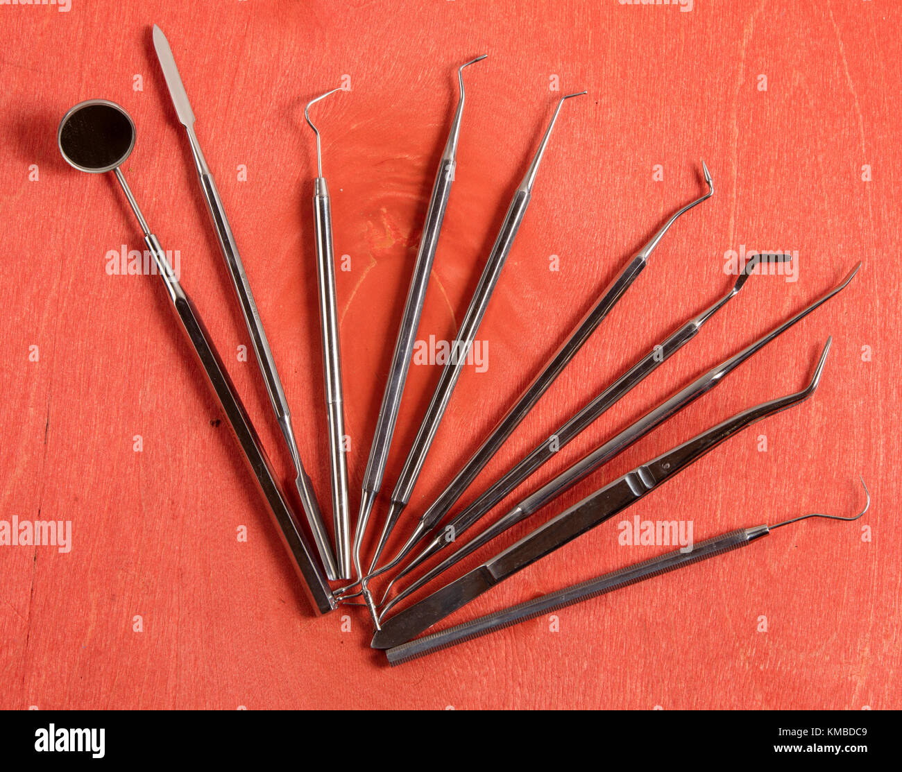 set of dentist tools on wooden background Stock Photo Alamy
