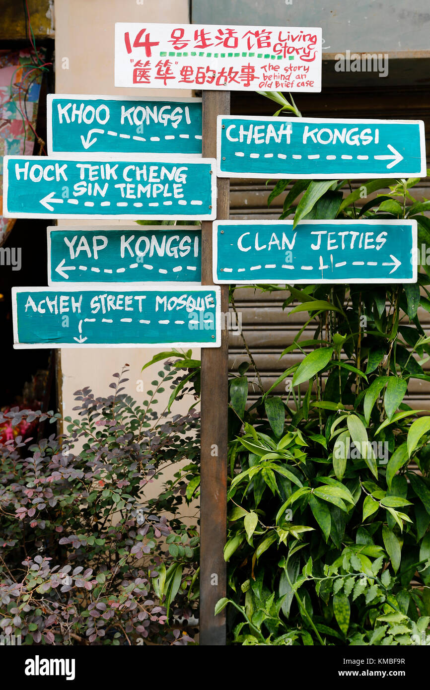 Street sign giving directions to popular tourist attractions located in the UNESCO World Heritage Site of Georgetown, Penang, Malaysia. Stock Photo