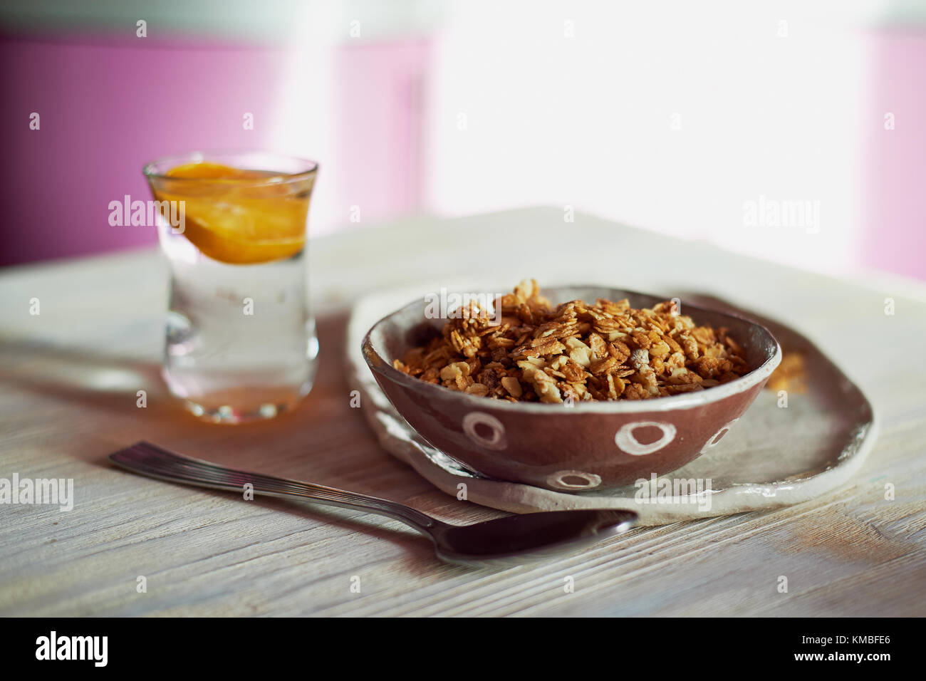 Healthy Breakfast of Champions. Muesli , a glass of water with a slice
