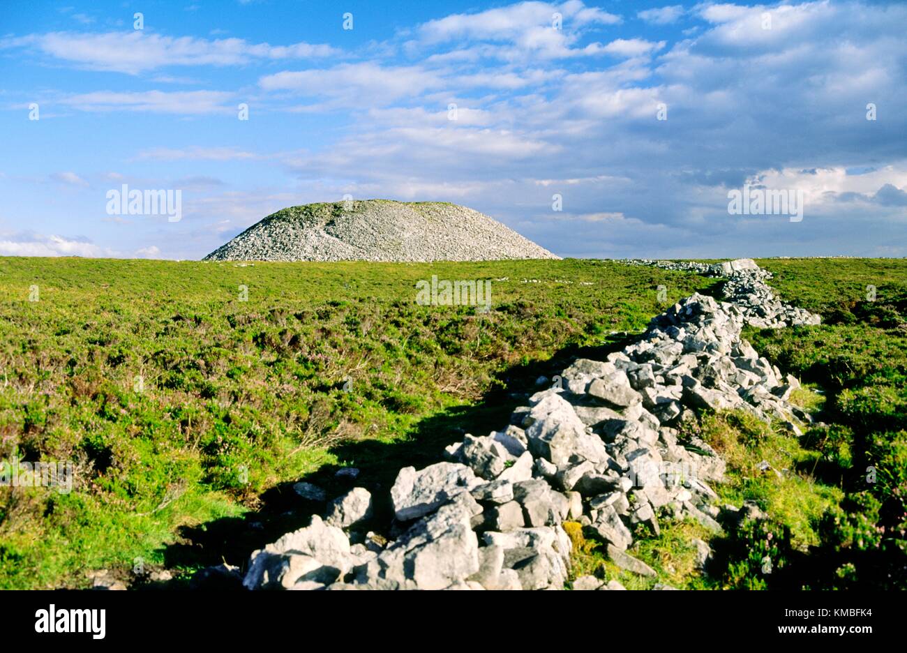 Prehistoric burial mound cairn known as Maeve's Cairn or Maeve's Tump on top of Knocknarea mountain, County Sligo, Ireland Eire Stock Photo