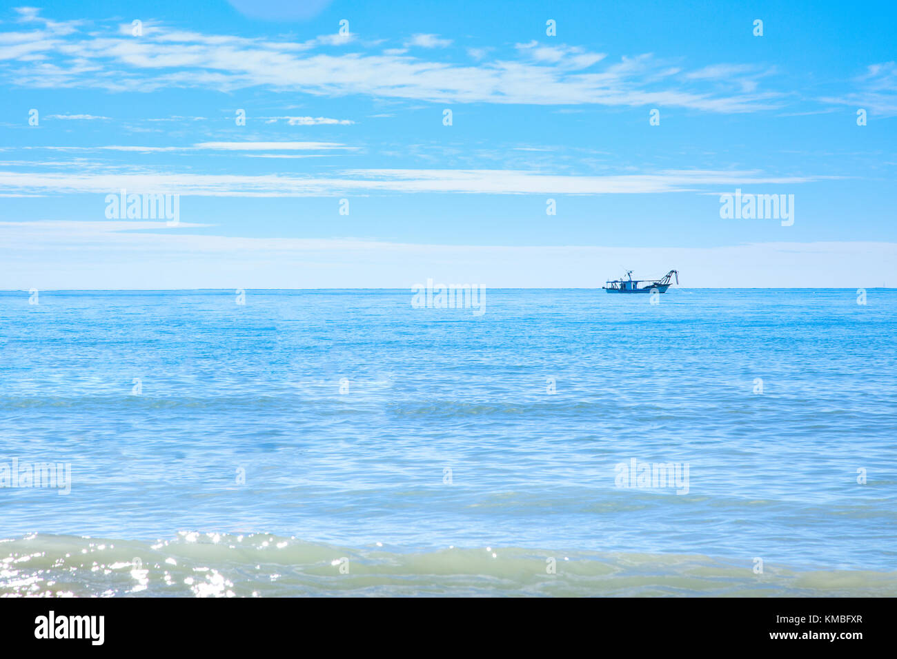fishing boat in the sea early in the morning Stock Photo - Alamy