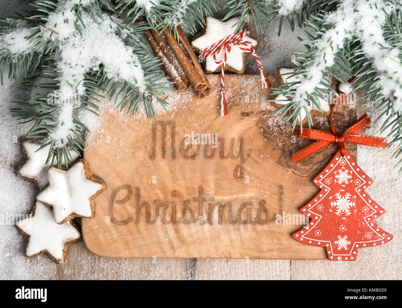 Merry Christmas Burning Subtitles In Wood Stock Photo - Download