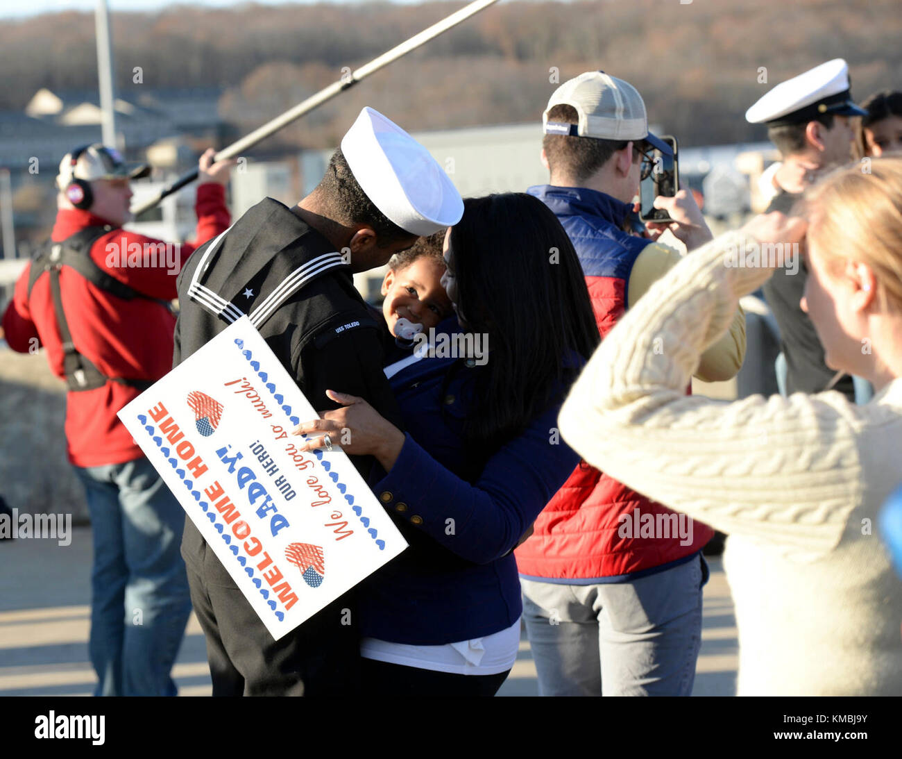 Yeoman Submarines 1st Class Craig Chandler is greeted by his wife Devy