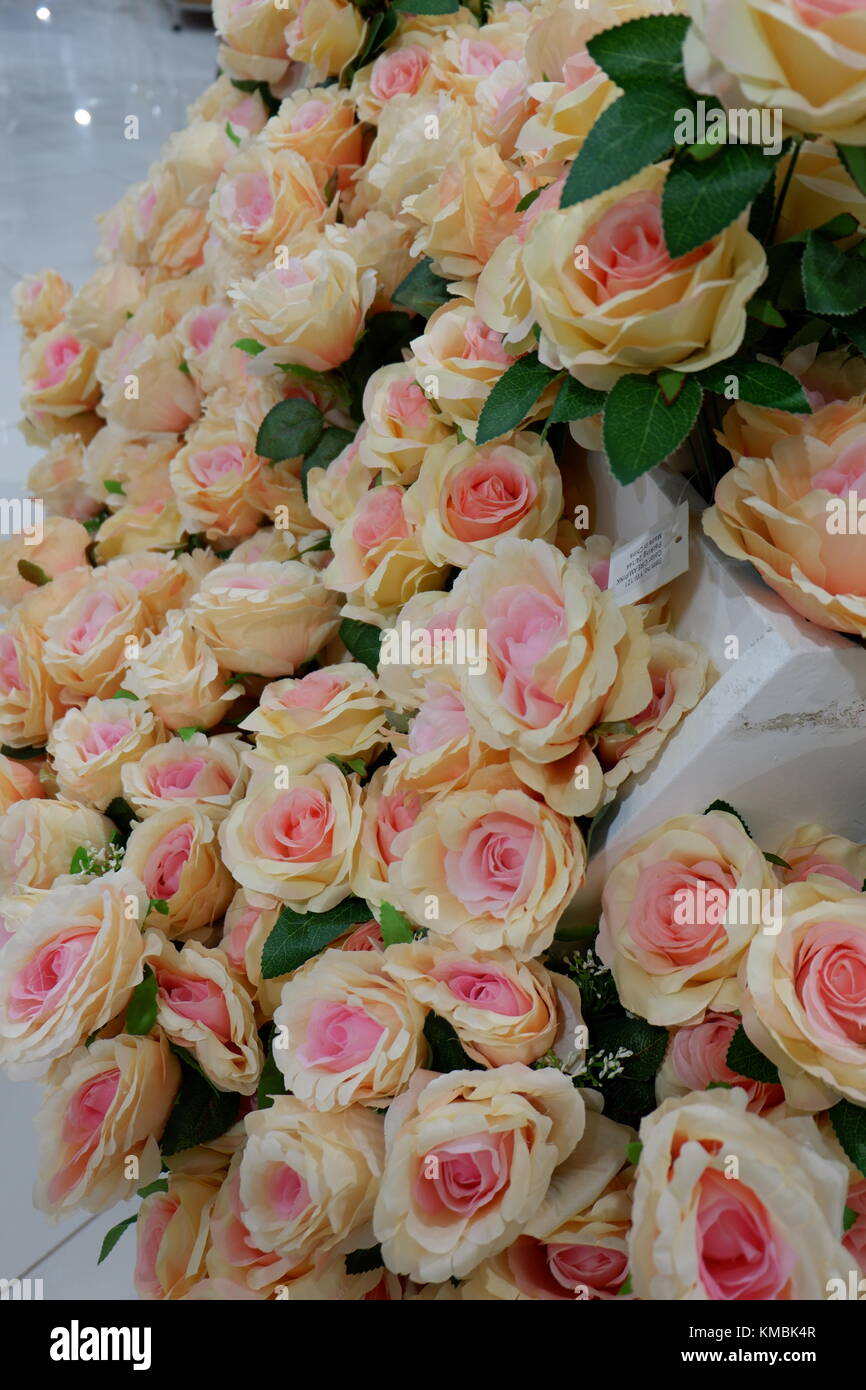 Artificial Rose flowers on display looking fresh and real, properly arrange. captured in different angle Stock Photo