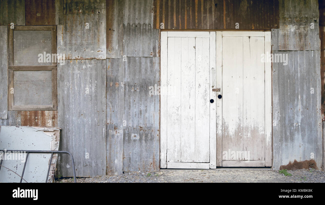 Old warehouse with galvanized steel wall Stock Photo - Alamy