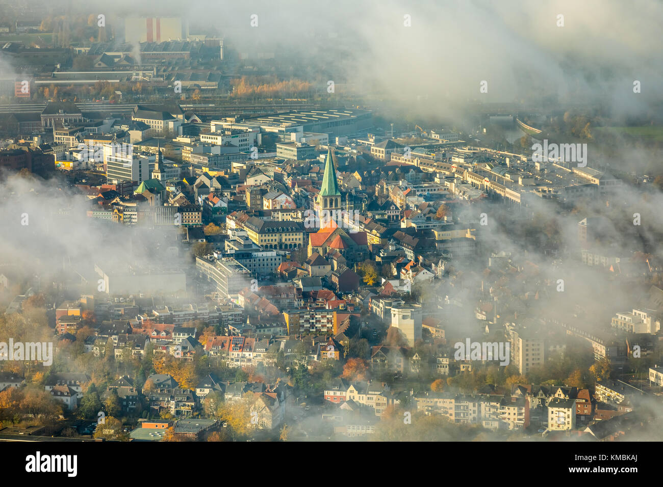View of downtown Hamm through the low fog cover, Pauluskirche, new Lippe project Kanalkante, between Hamm-Lippewiesen airport Stock Photo