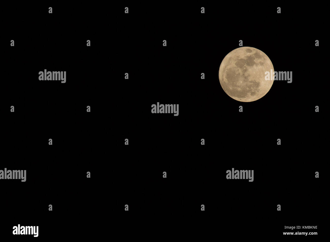 Close up of The Full Moon in the Night time with Black sky background ...