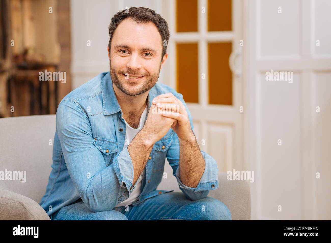 Optimistic gay man participating evening Stock Photo