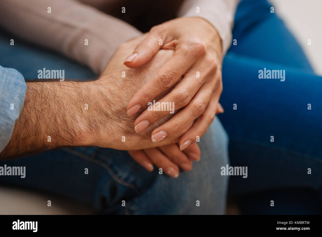 Loving couple holding hands with love Stock Photo - Alamy